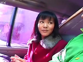 Aroused fucker mauls hairy pussy of Japanese slut Eri Minami in the car